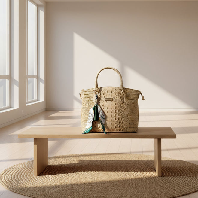 Beige crocodile handbag with tassel handbag charm
