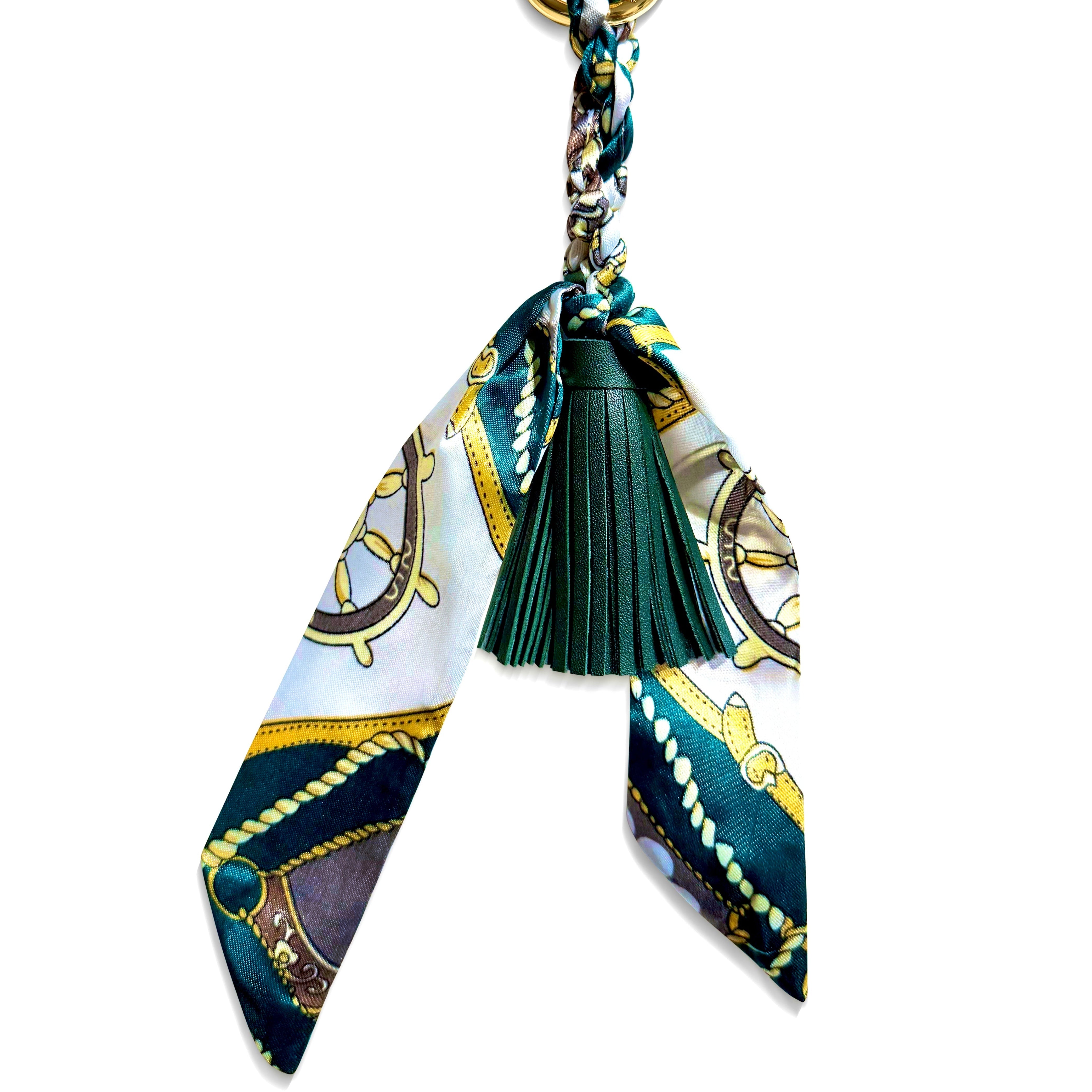 Green patterned fabric and leather tassel handbag charm